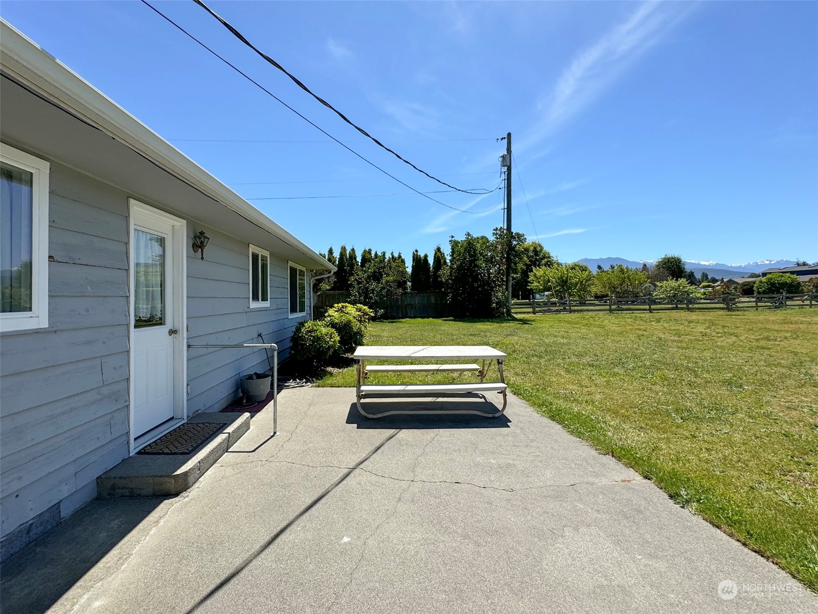 8944 Old Olympic Highway Sequim, WA 98382 - Photo 36 of 40 a front view of a house with a garden