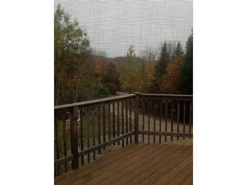 410 Howard Pond Road Hanover, ME 04237 - Photo 16 of 17 Exterior Front. This large deck off...