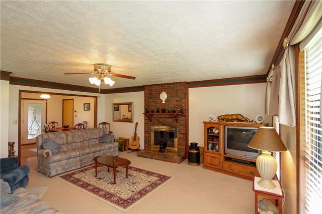 4024 New Chapel Road Springfield, TN 37172 - Photo 8 of 20 Beautiful living area with brick fire place