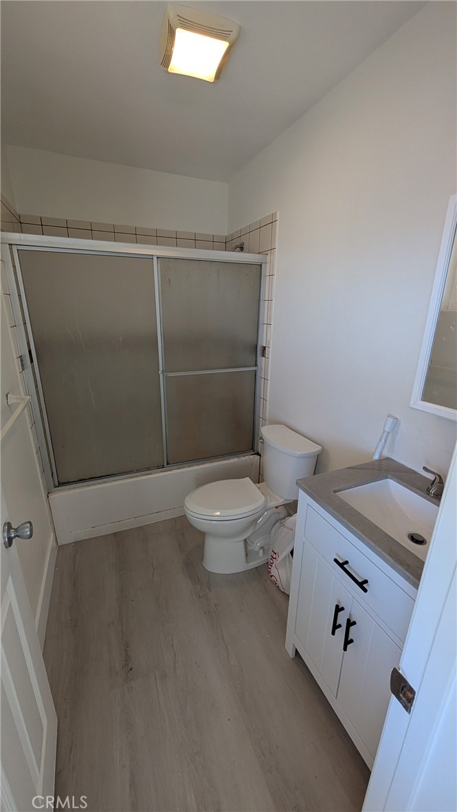 905 West Sumner Avenue, Unit B Lake Elsinore, CA 92530 - Photo 12 of 15 a bathroom with a toilet and a sink