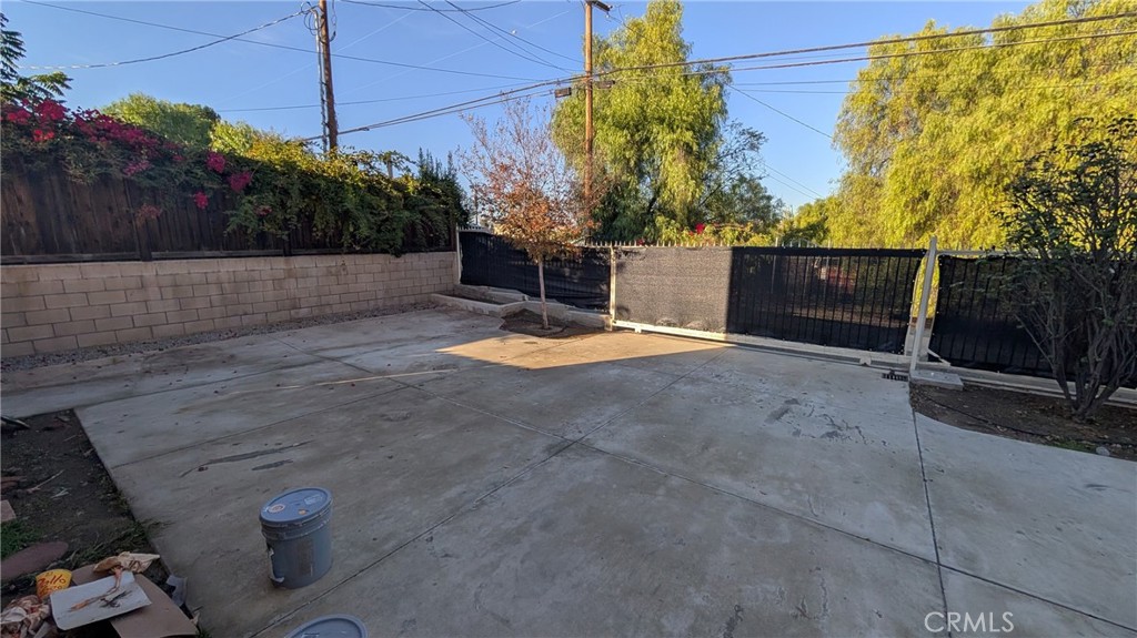 905 West Sumner Avenue, Unit B Lake Elsinore, CA 92530 - Photo 13 of 15 a view of backyard and trees