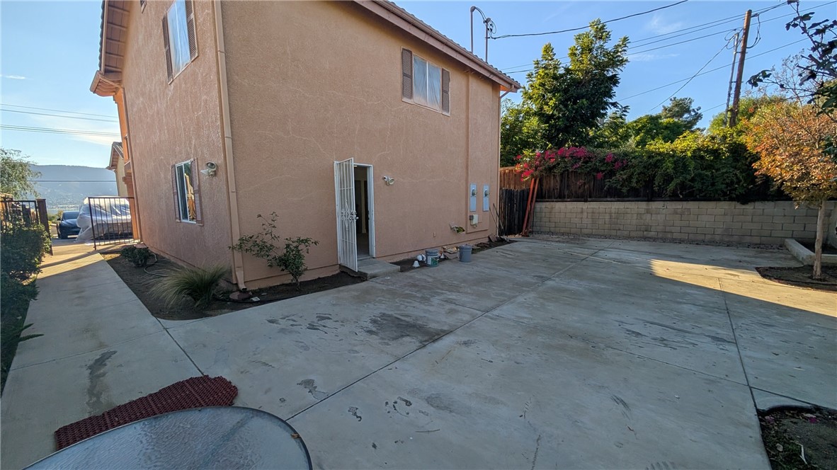 905 West Sumner Avenue, Unit B Lake Elsinore, CA 92530 - Photo 15 of 15 a view of a backyard with sitting area