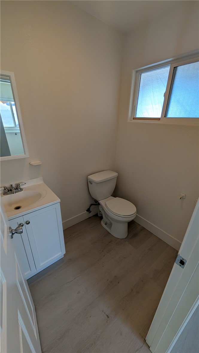 905 West Sumner Avenue, Unit B Lake Elsinore, CA 92530 - Photo 4 of 15 a bathroom with a toilet
