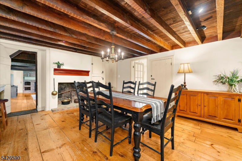 179 Lindbergh Road Hopewell, NJ 08525 - Photo 10 of 46 a view of a dining room with furniture and wooden floor