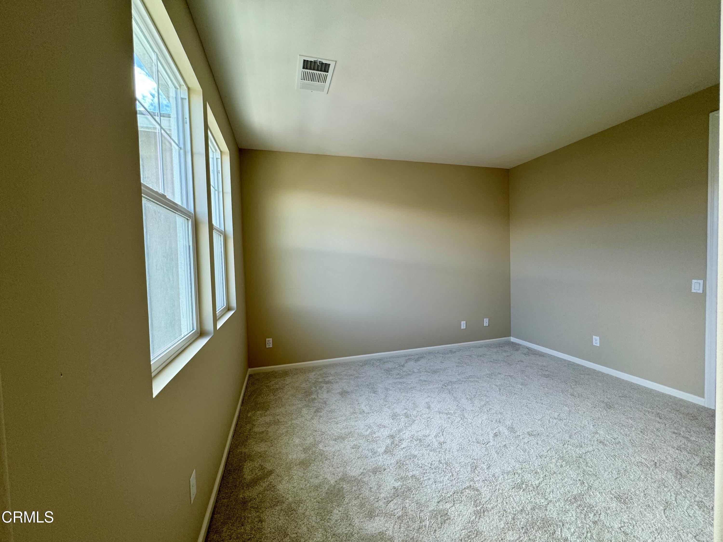 3667 Islander Walk Oxnard, CA 93035 - Photo 19 of 33 an empty room with windows