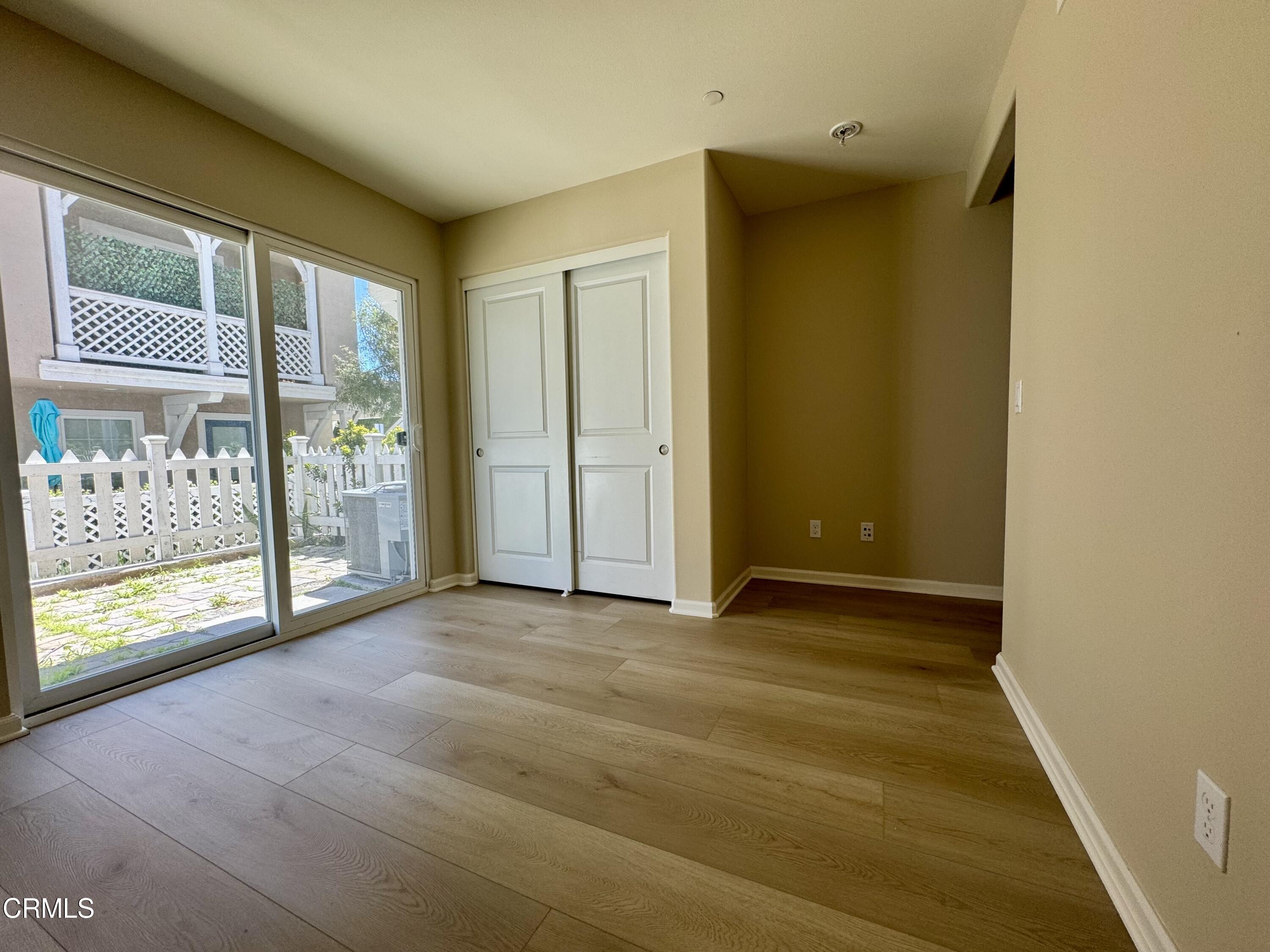 3667 Islander Walk Oxnard, CA 93035 - Photo 30 of 33 a view of an empty room with glass door