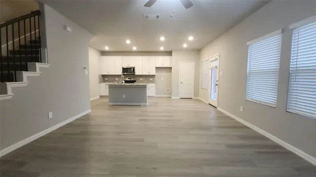 a view of entryway with stairs