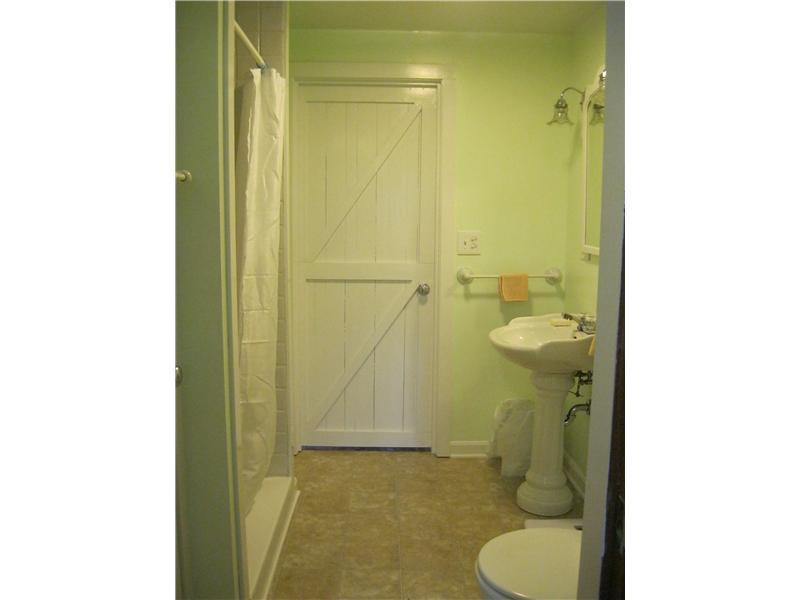 45 Reach Road Brooklin, ME 04616 - Photo 10 of 16 Bathroom. Door leads to first floor...