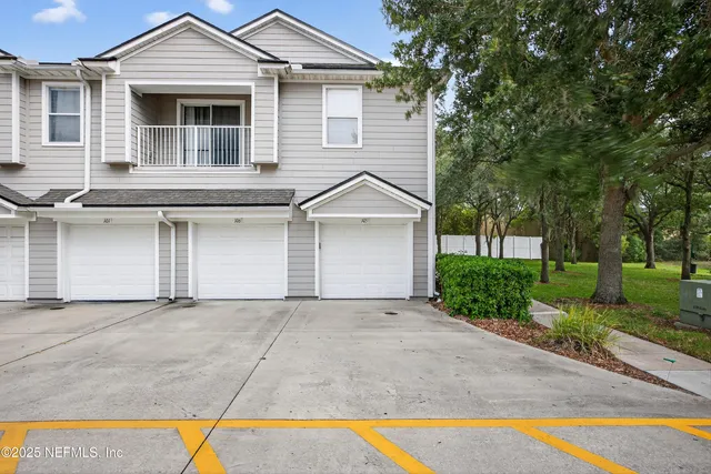 front view of a house with a street