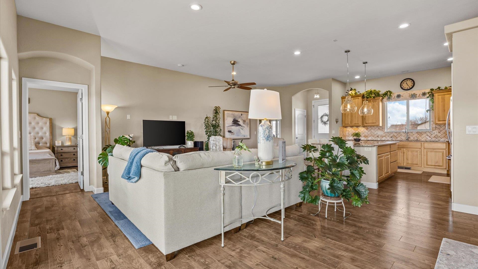 686 Beech Avenue Fruita, CO 81521 - Photo 13 of 33 a living room with furniture and a chandelier