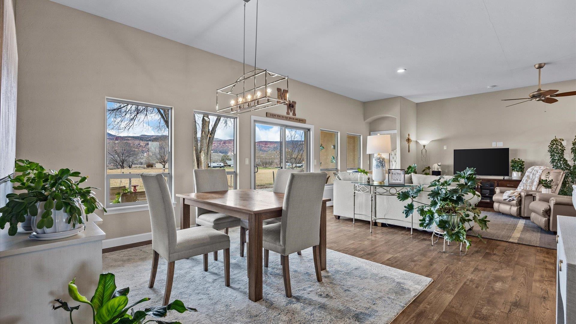 686 Beech Avenue Fruita, CO 81521 - Photo 17 of 33 a view of a dining room with furniture window and wooden floor
