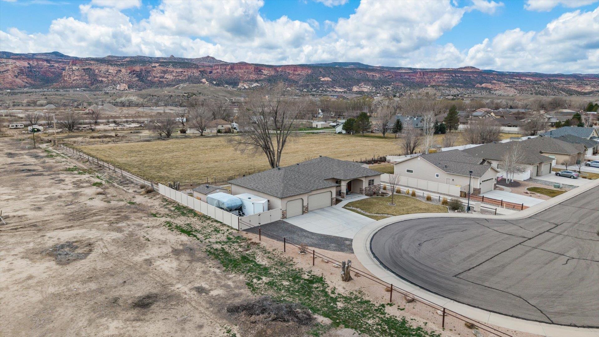 686 Beech Avenue Fruita, CO 81521 - Photo 5 of 33 an aerial view of a house with a yard