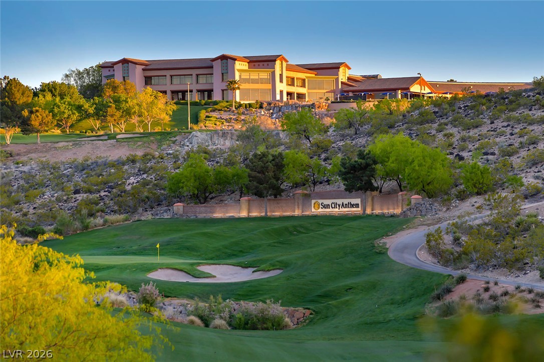 1680 Fieldbrook Street Henderson, NV 89052 - Photo 23 of 32 Lush fairways and manicured greens rest below the hillside community clubhouse.