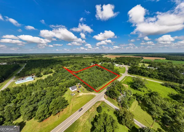 a view of a golf course with a lake
