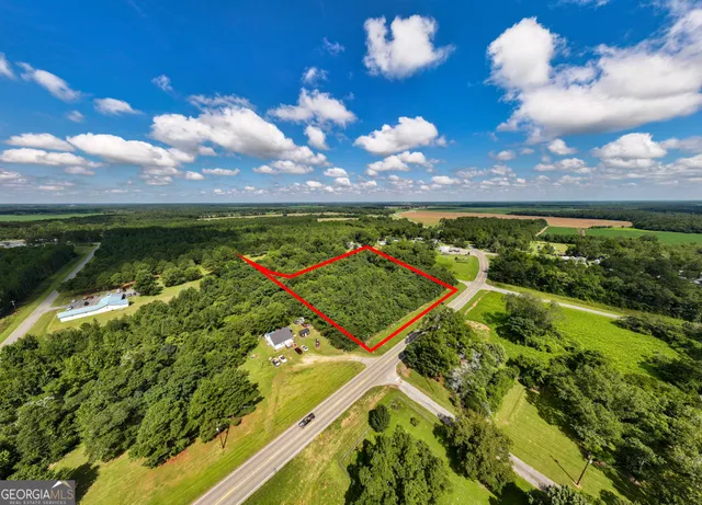 a view of a golf course with a lake
