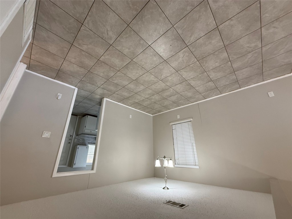 107 Owen Circle Georgetown, TX 78626 - Photo 4 of 13 an empty room with staircase and white walls