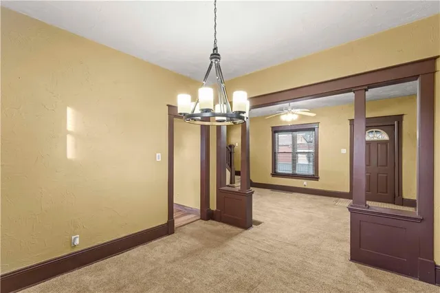 a kitchen that has a sink and a stove