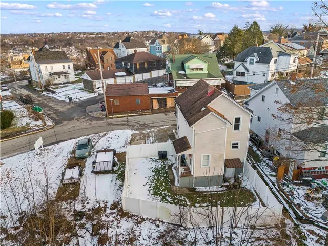 an aerial view of multiple house