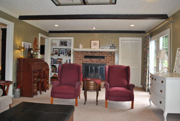 3467 Half Acre Of Rocks Road Elliston, VA 24087 - Photo 13 of 61 a living room with furniture a flat screen tv and a fireplace