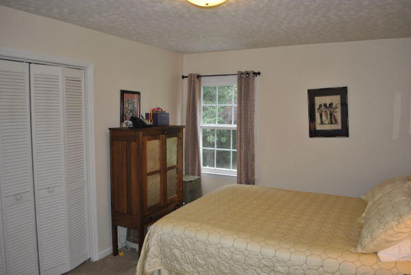 3467 Half Acre Of Rocks Road Elliston, VA 24087 - Photo 20 of 61 a bedroom with a bed and a window