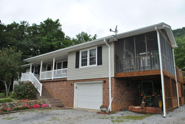 3467 Half Acre Of Rocks Road Elliston, VA 24087 - Photo 37 of 61 a front view of a house with garden