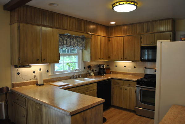3467 Half Acre Of Rocks Road Elliston, VA 24087 - Photo 7 of 61 a kitchen with a sink appliances and cabinets