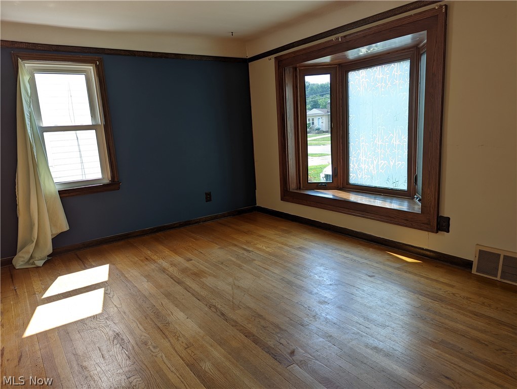 13817 Granger Road Cleveland, OH 44125 - Photo 2 of 22 Living room with new bay window.