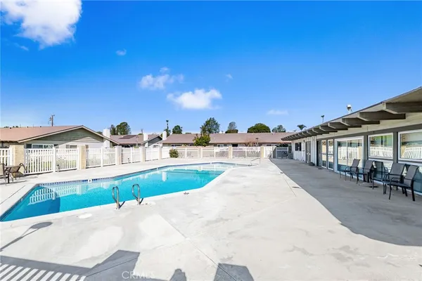 a view of a house with a swimming pool