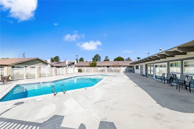 a view of a house with a swimming pool
