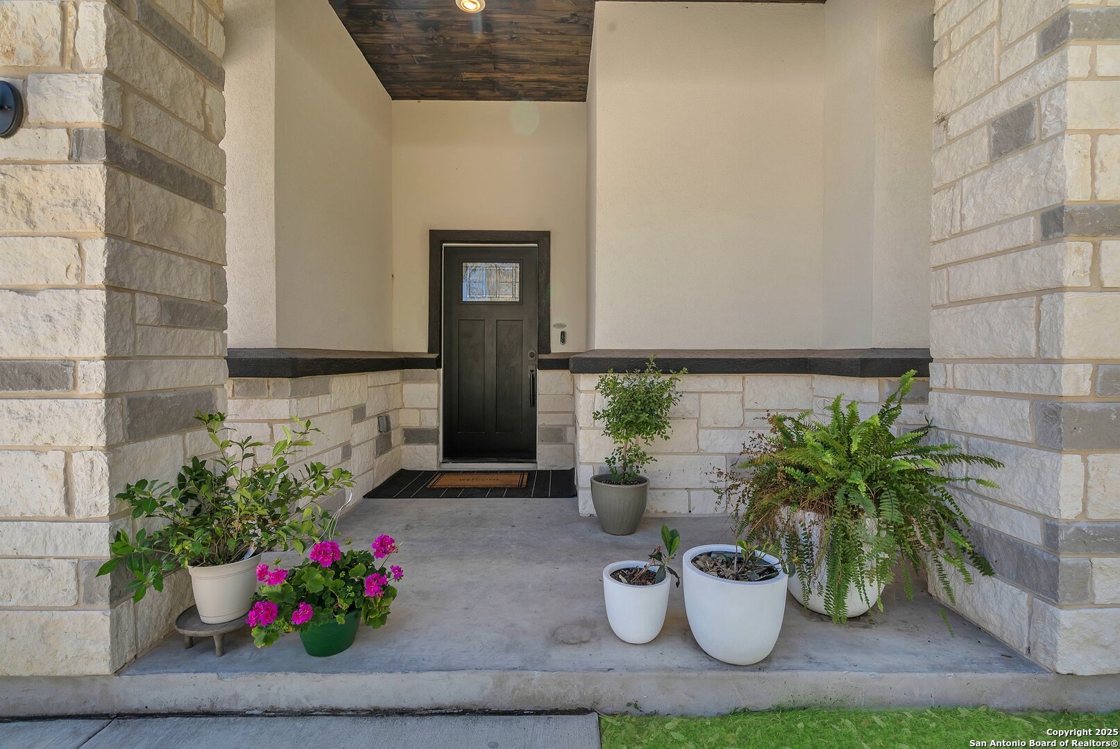 348 Fawn Drive Spring Branch, TX 78070 - Photo 3 of 48 a potted plant sitting on a wooden floor