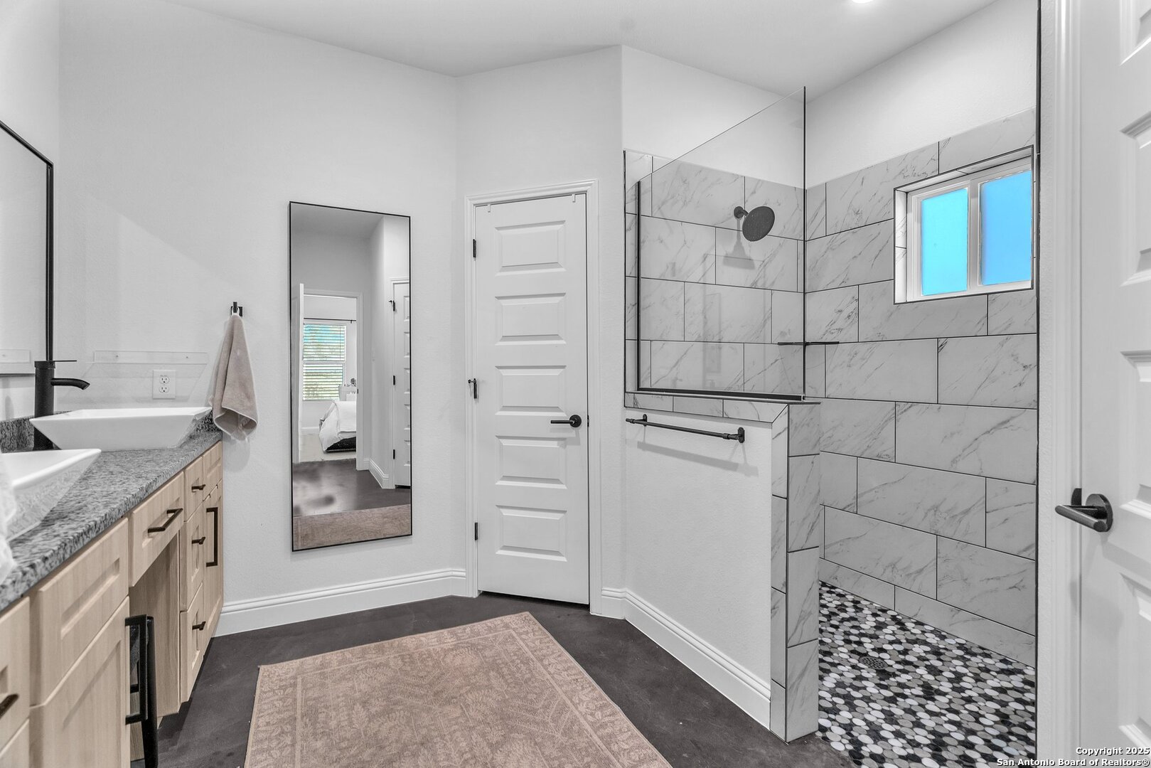 348 Fawn Drive Spring Branch, TX 78070 - Photo 34 of 48 a bathroom with a granite countertop sink a toilet and shower