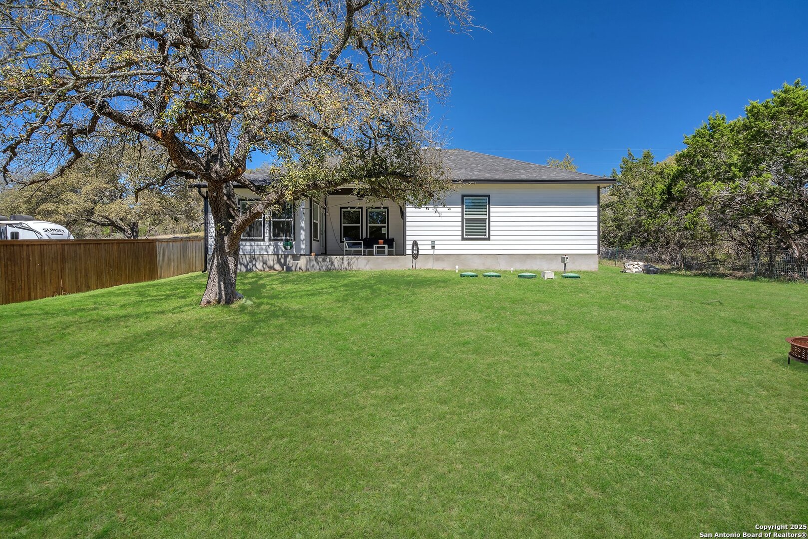 348 Fawn Drive Spring Branch, TX 78070 - Photo 47 of 48 a view of a house with a yard