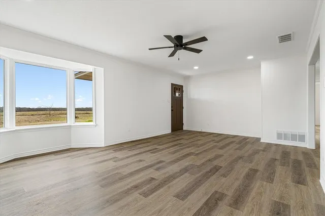 a view of an empty room and window
