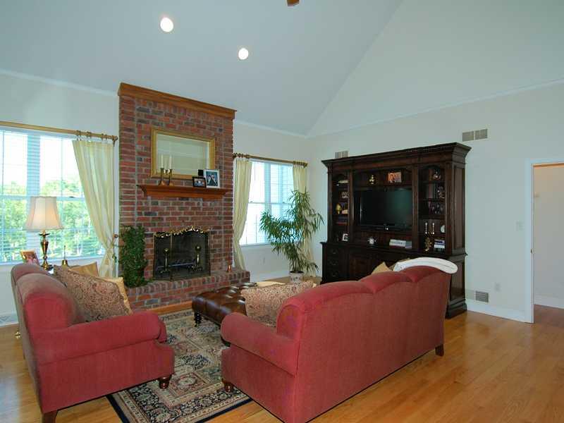 2315 Rochester Road Franklin Park, PA 15237 - Photo 11 of 25 Great Room. Great room with masonry fireplace, hardwood floor and vaulted ceiling...