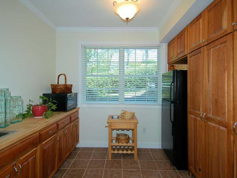 2315 Rochester Road Franklin Park, PA 15237 - Photo 24 of 25 Kitchen. Lower level kitchenette with ceramic tile floor, cherry cabinets...