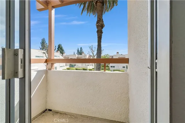 a view of balcony with furniture