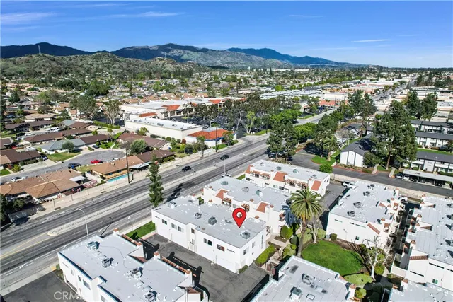 an aerial view of a city with lots of residential buildings