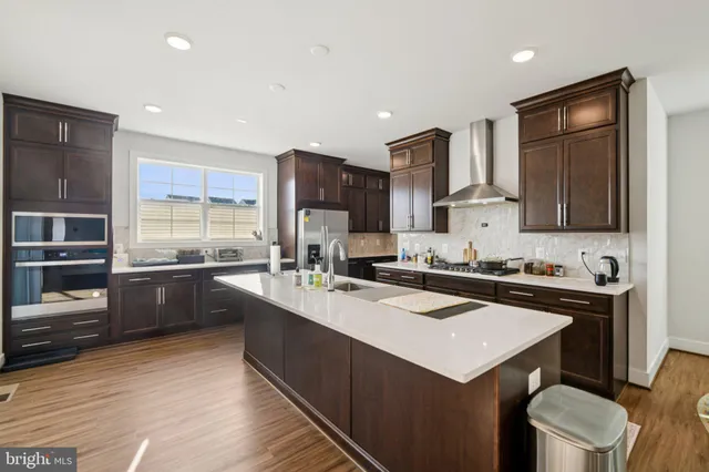 a bedroom with furniture and a flat screen tv