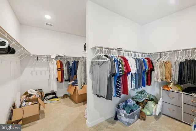 a bathroom with a sink double vanity and a mirror