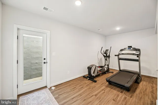 a view of a balcony with wooden floor