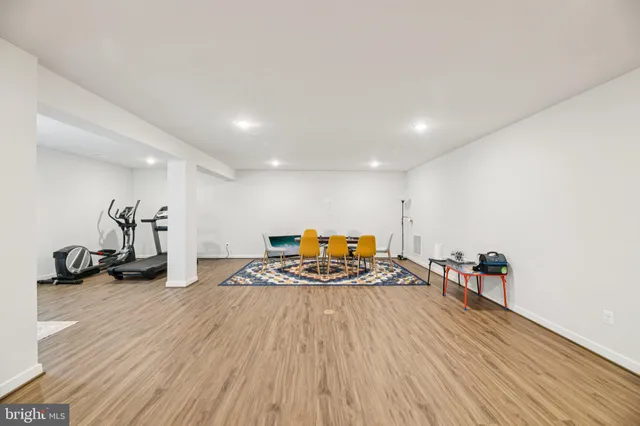a view of a balcony with wooden floor