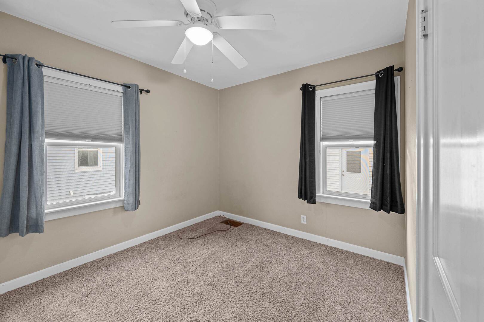 2517 3rd Street East Moline, IL 61244 - Photo 12 of 22 a view of a room that has a window in it