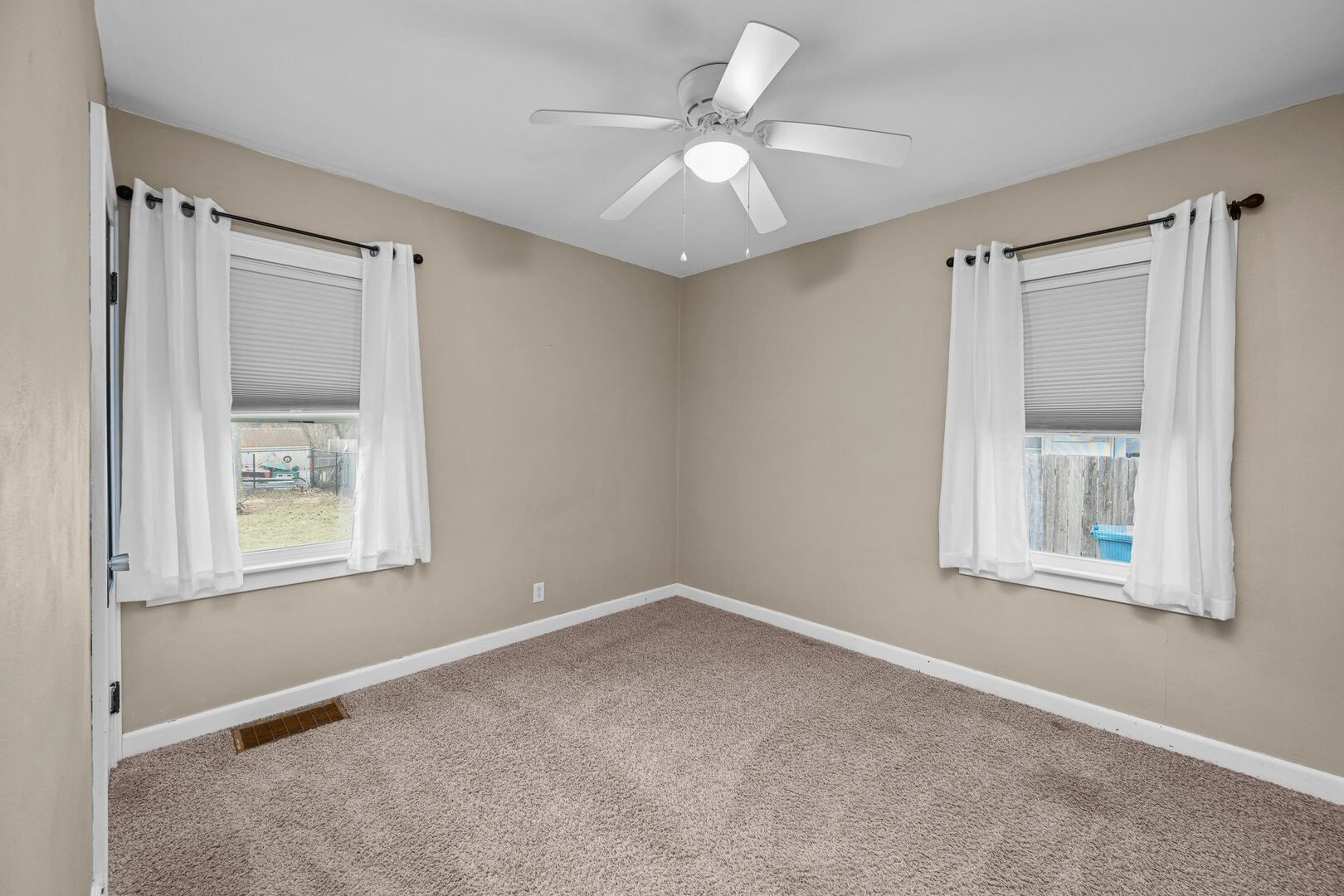 2517 3rd Street East Moline, IL 61244 - Photo 14 of 22 an empty room with windows and closet