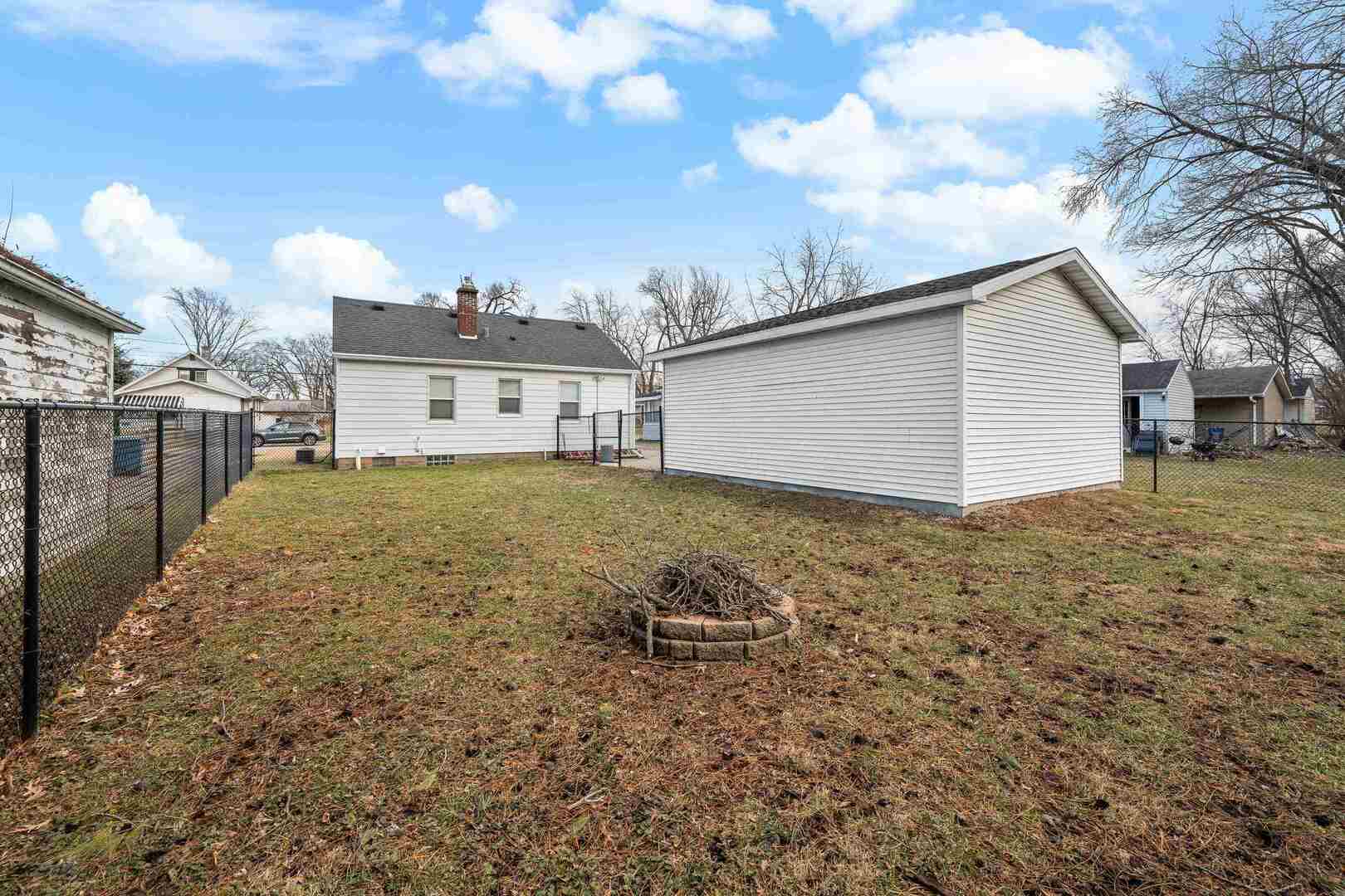 2517 3rd Street East Moline, IL 61244 - Photo 22 of 22 a view of a house with a yard