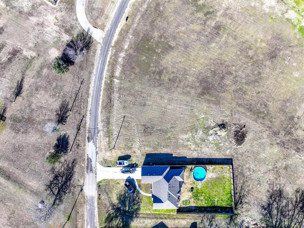 Tbd Whipporwill Drive Wills Point, TX 75169 - Photo 16 of 20 a view of living room with furniture and a fireplace