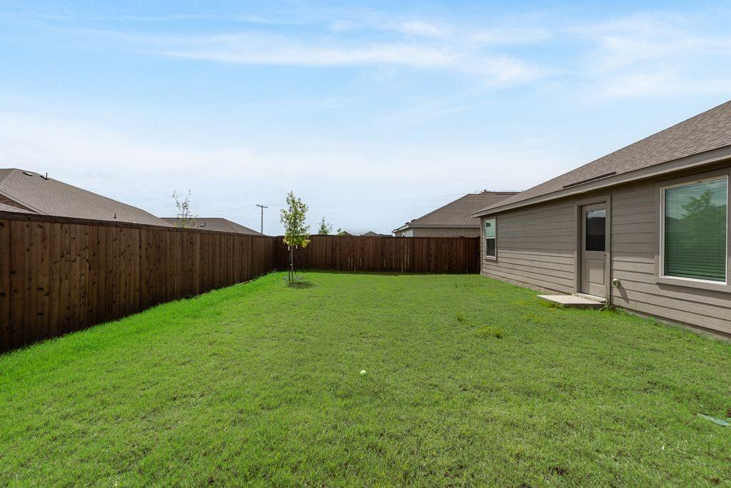 14112 Hammersmith Street Pilot Point, TX 76258 - Photo 18 of 19 a view of a backyard