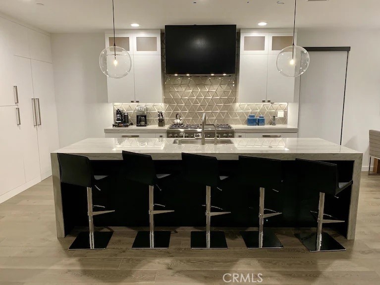 116 West Channel Islands Boulevard Oxnard, CA 93035 - Photo 12 of 60 a kitchen with a sink and cabinets