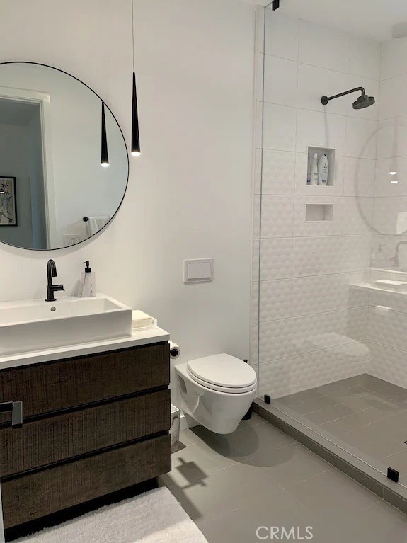 116 West Channel Islands Boulevard Oxnard, CA 93035 - Photo 26 of 60 a bathroom with a sink a toilet and shower