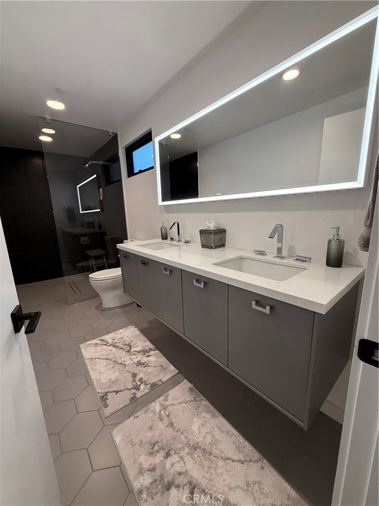 116 West Channel Islands Boulevard Oxnard, CA 93035 - Photo 46 of 60 a kitchen with a sink and cabinets
