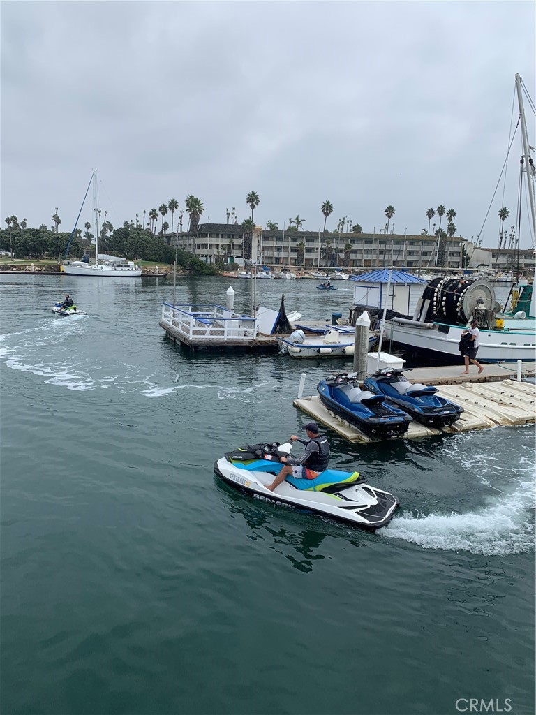 116 West Channel Islands Boulevard Oxnard, CA 93035 - Photo 56 of 60 a view of a lake with boats and trees in the background